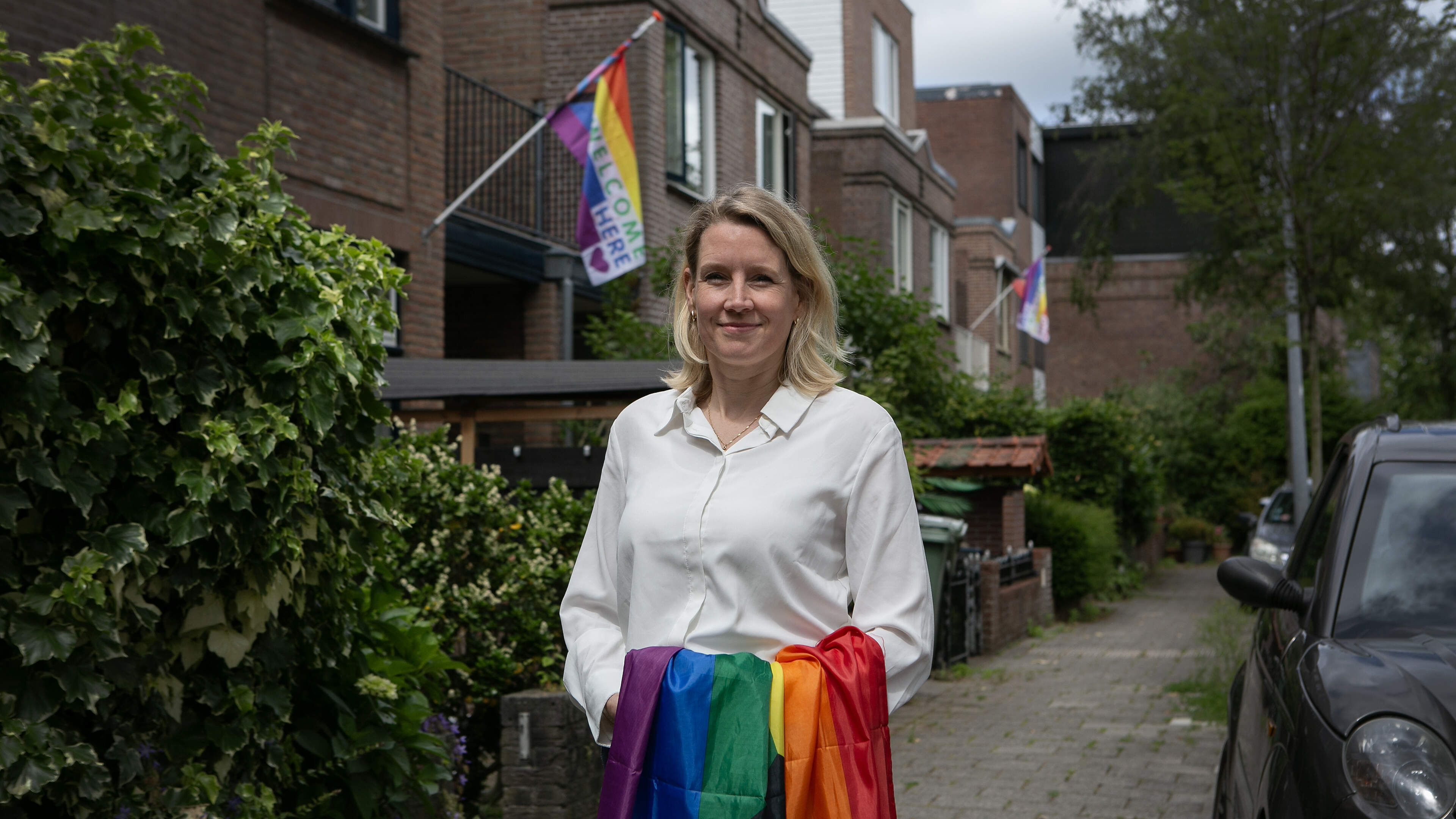 Amanda's son received a threatening letter after hanging a pride flag. The neighborhood rallied in support: 'We want to let our neighbor know he is welcome here'