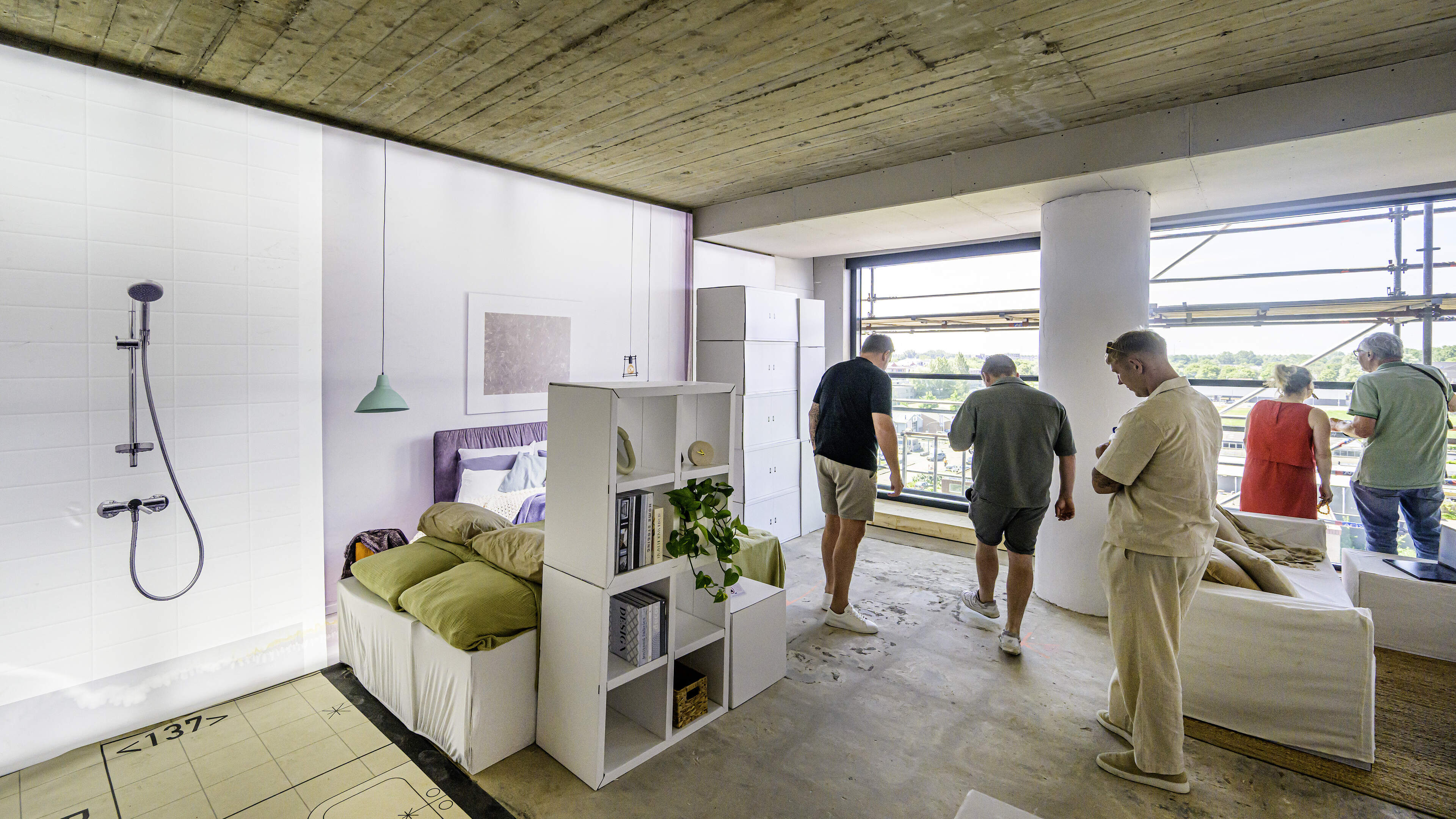 After Bolstoren, developer wants to quickly move forward with three apartment complexes: 'That tank is a nod to the parking discussions'