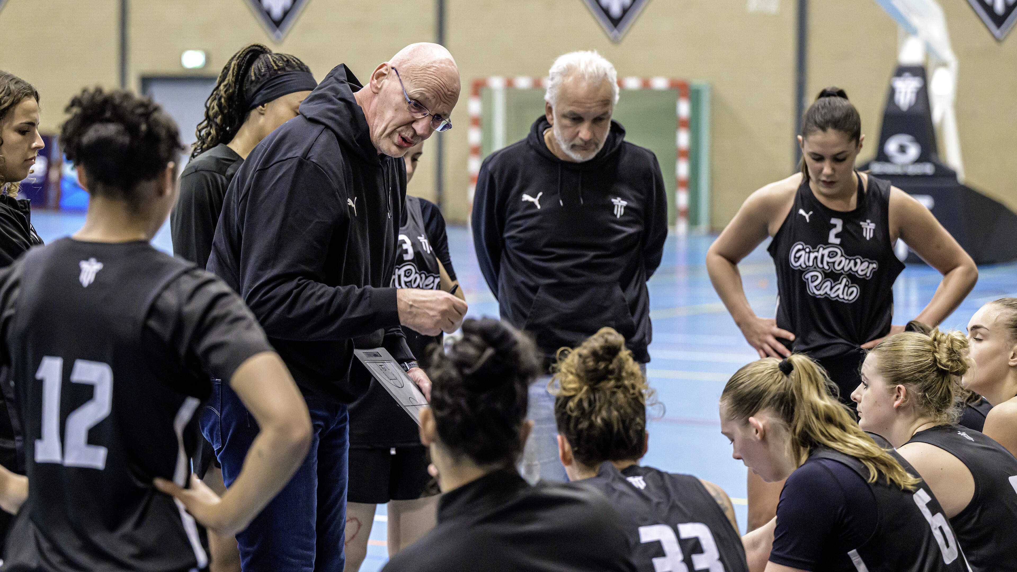 Triple Threat threatened with expulsion from basketball league over dirty floor; emergency measures taken to prevent it