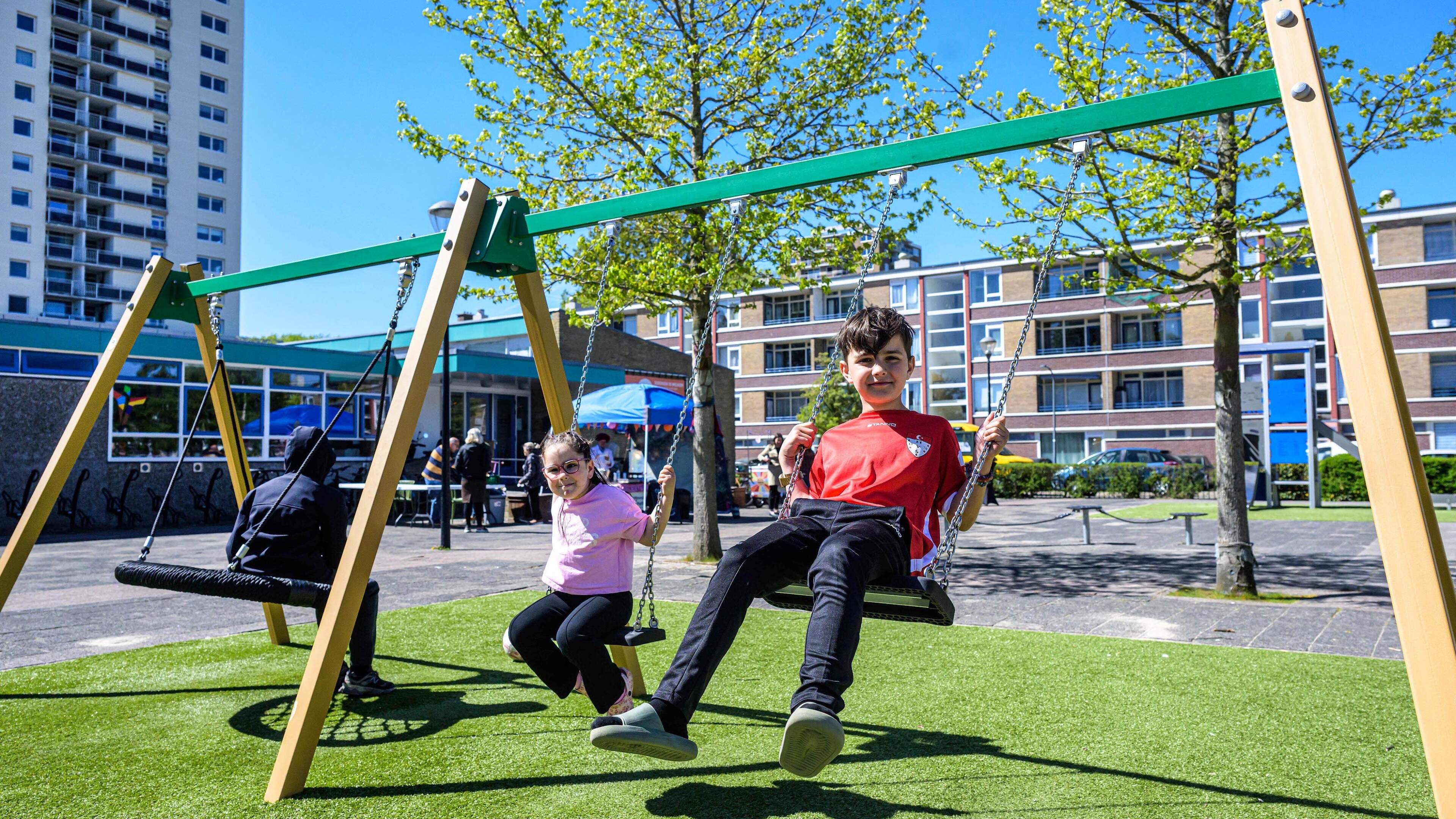 Loitering nuisance hangs like a dark cloud over opening of Prof. Boumanstraat playground. 'They scream and throw stones'